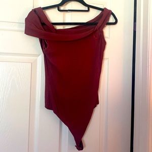 Large, Le Lis garnet body suit. Never worn.